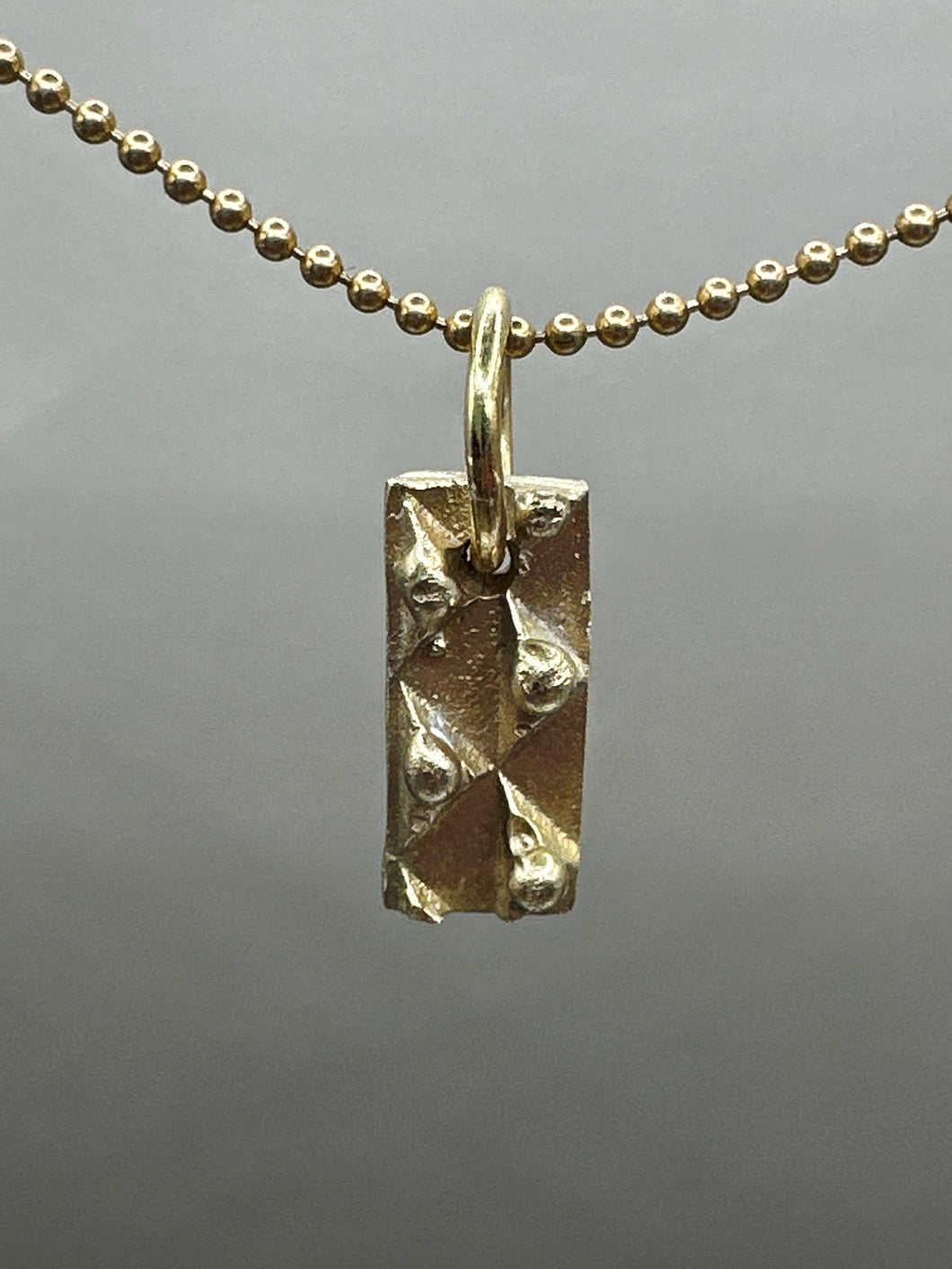 brass charm necklace