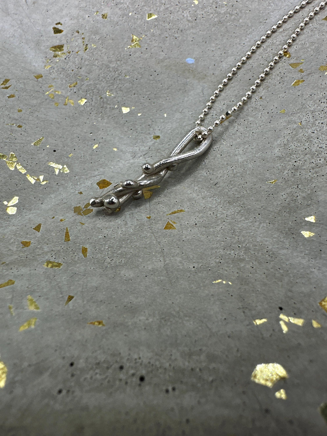 cast silver pendant