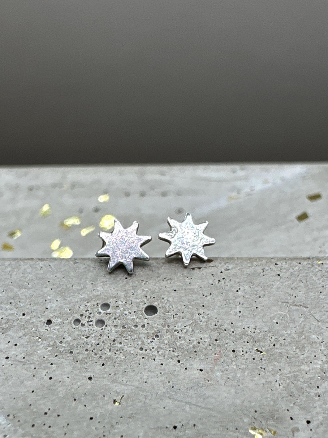 Tiny star earrings
