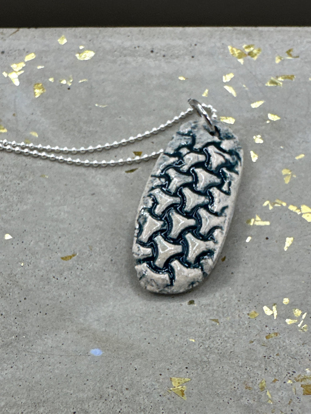 navy triangles pendant