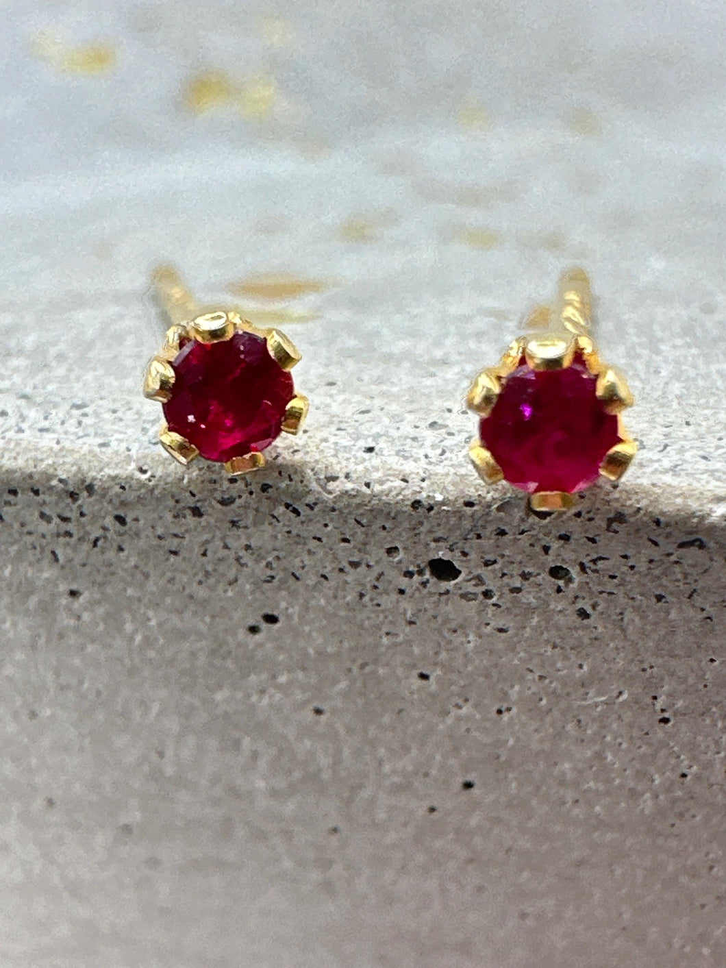 ruby stud earrings in gold - 2mm