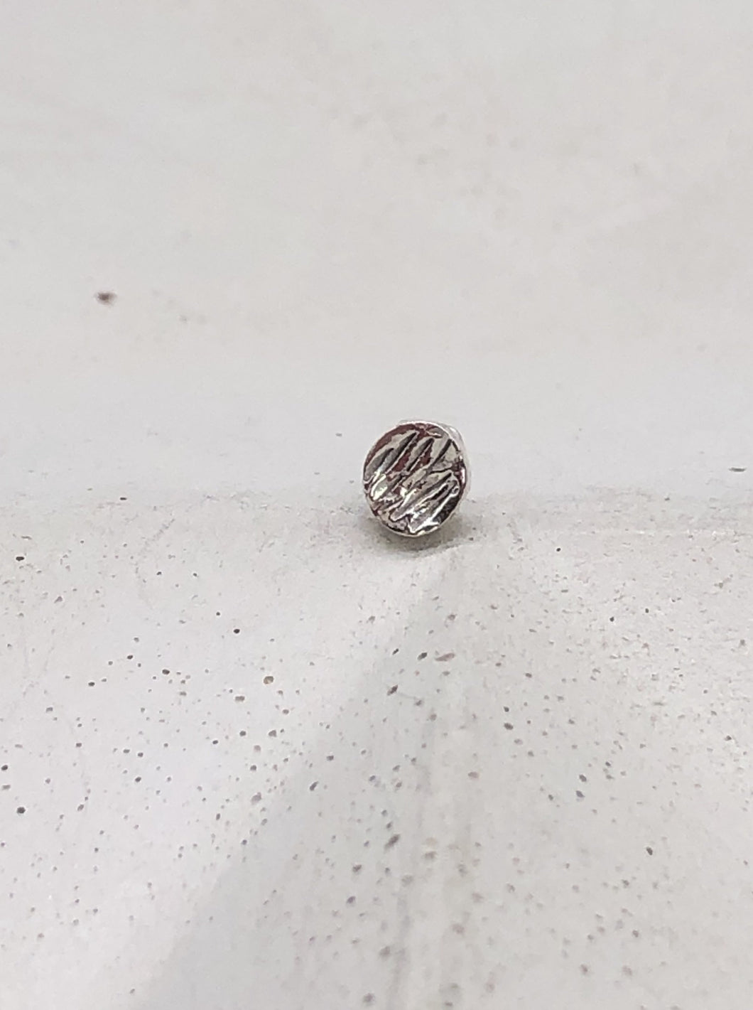 silver textured stud