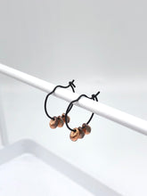 Load image into Gallery viewer, black hoops with copper beads
