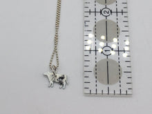 Load image into Gallery viewer, black and silver cow necklace
