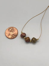 Load image into Gallery viewer, gold cord necklace with gold and copper glass beads
