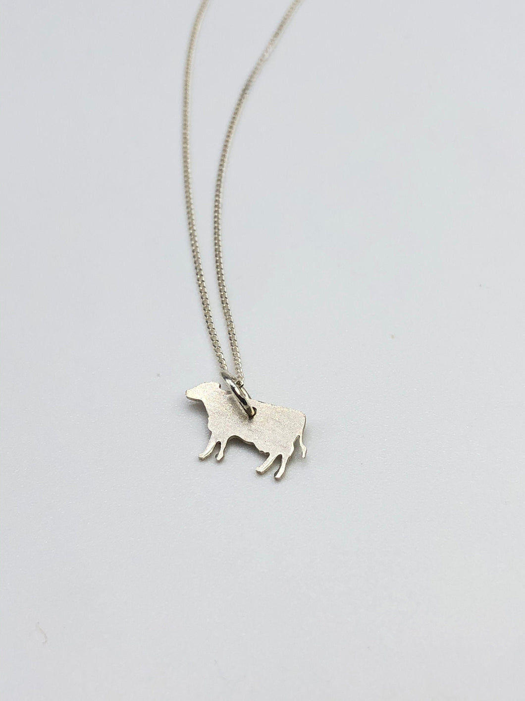 tiny cow necklace