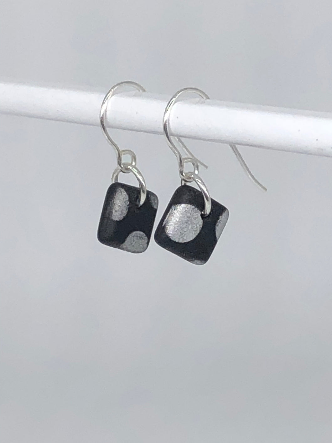 square earrings with dots