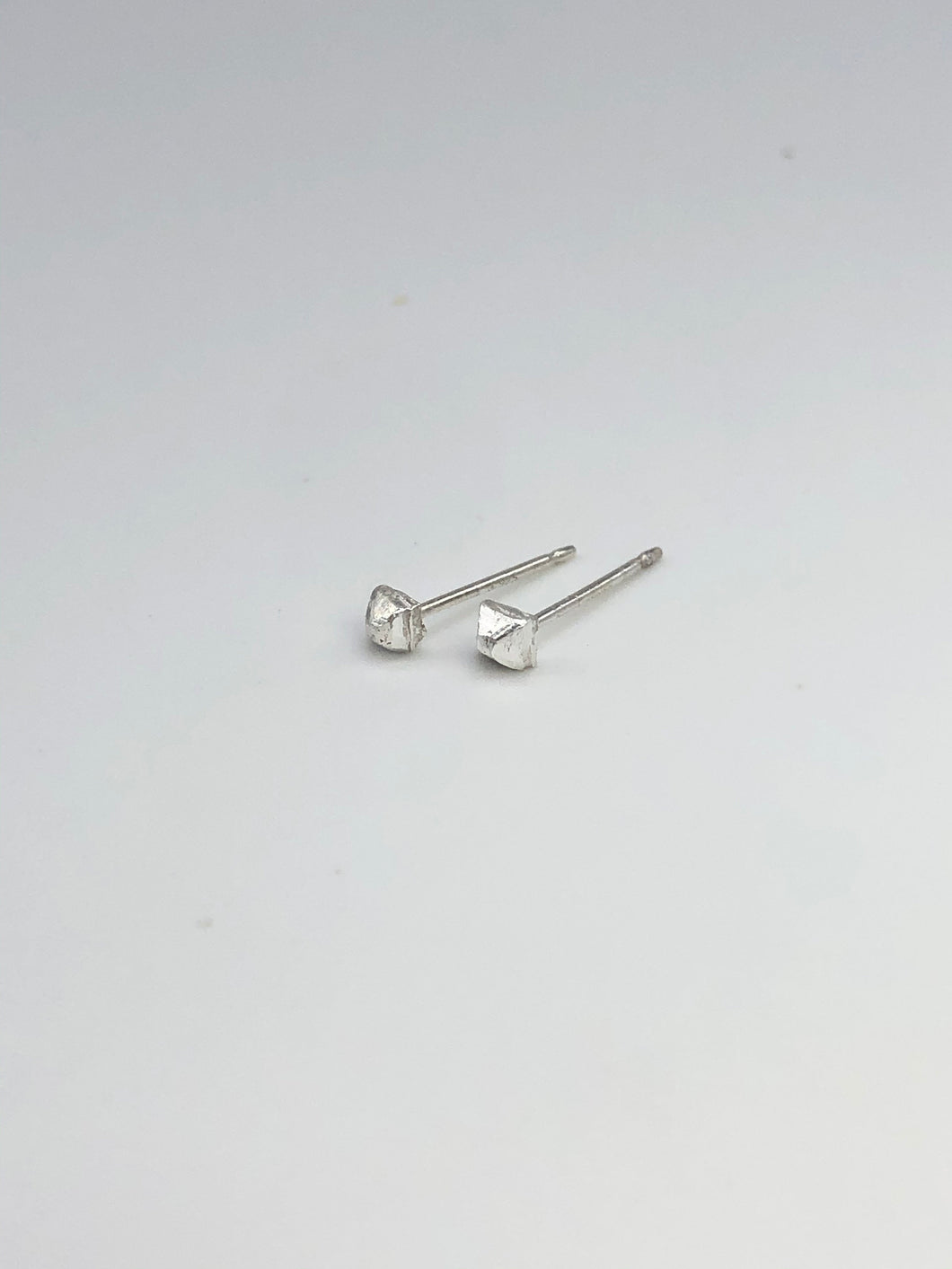 tiny silver pyramid studs