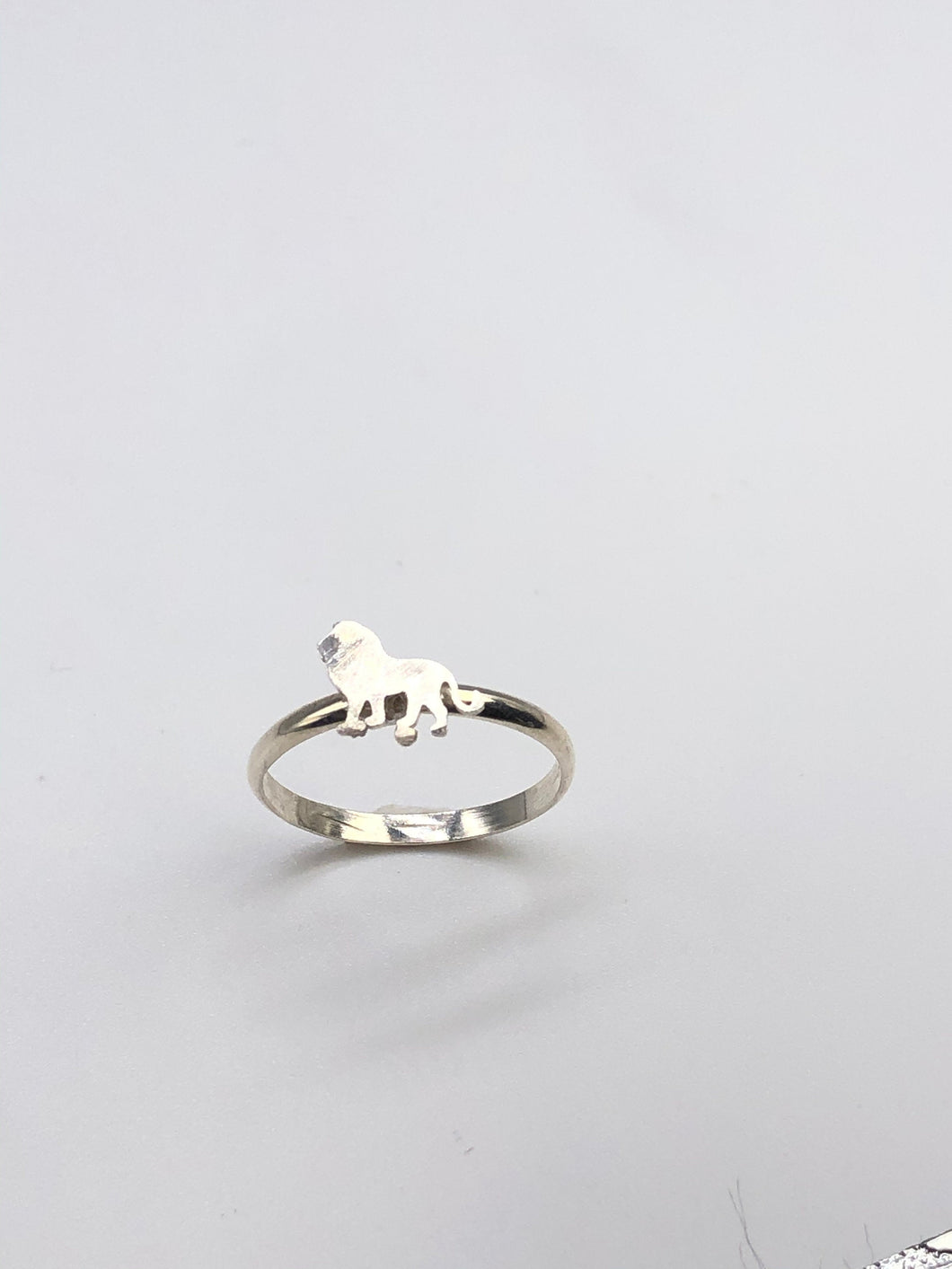 teeny lion ring