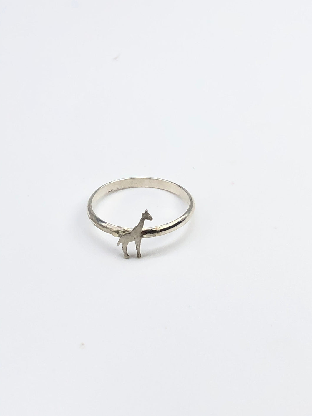 teeny giraffe ring