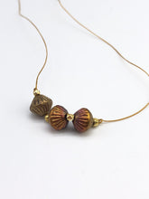 Load image into Gallery viewer, gold cord necklace with gold and copper glass beads
