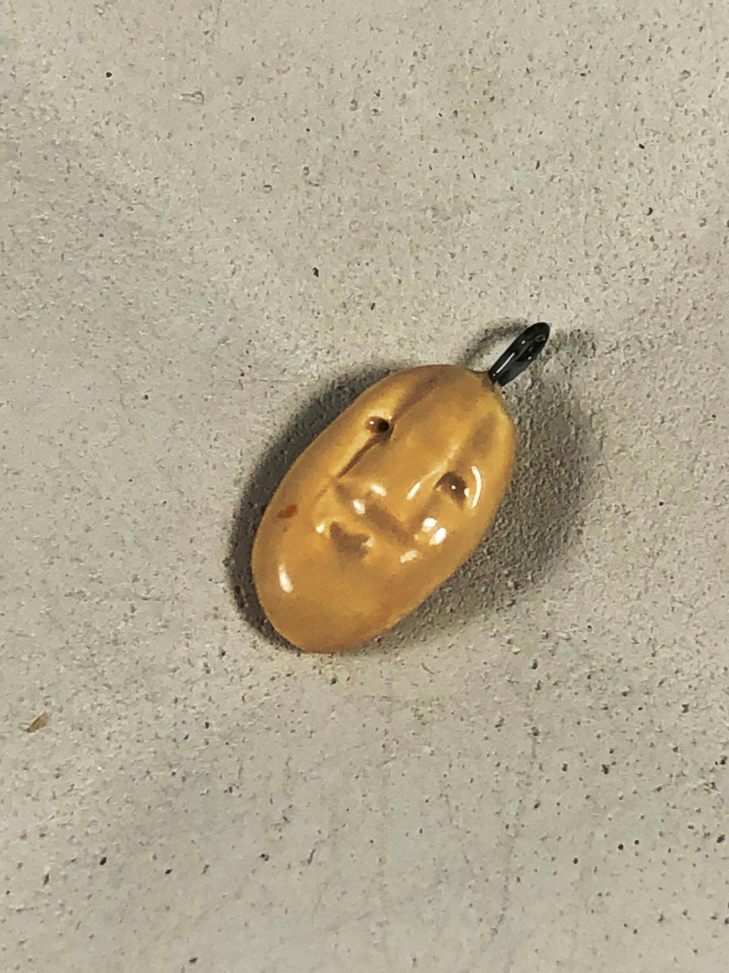 ceramic face pendant H