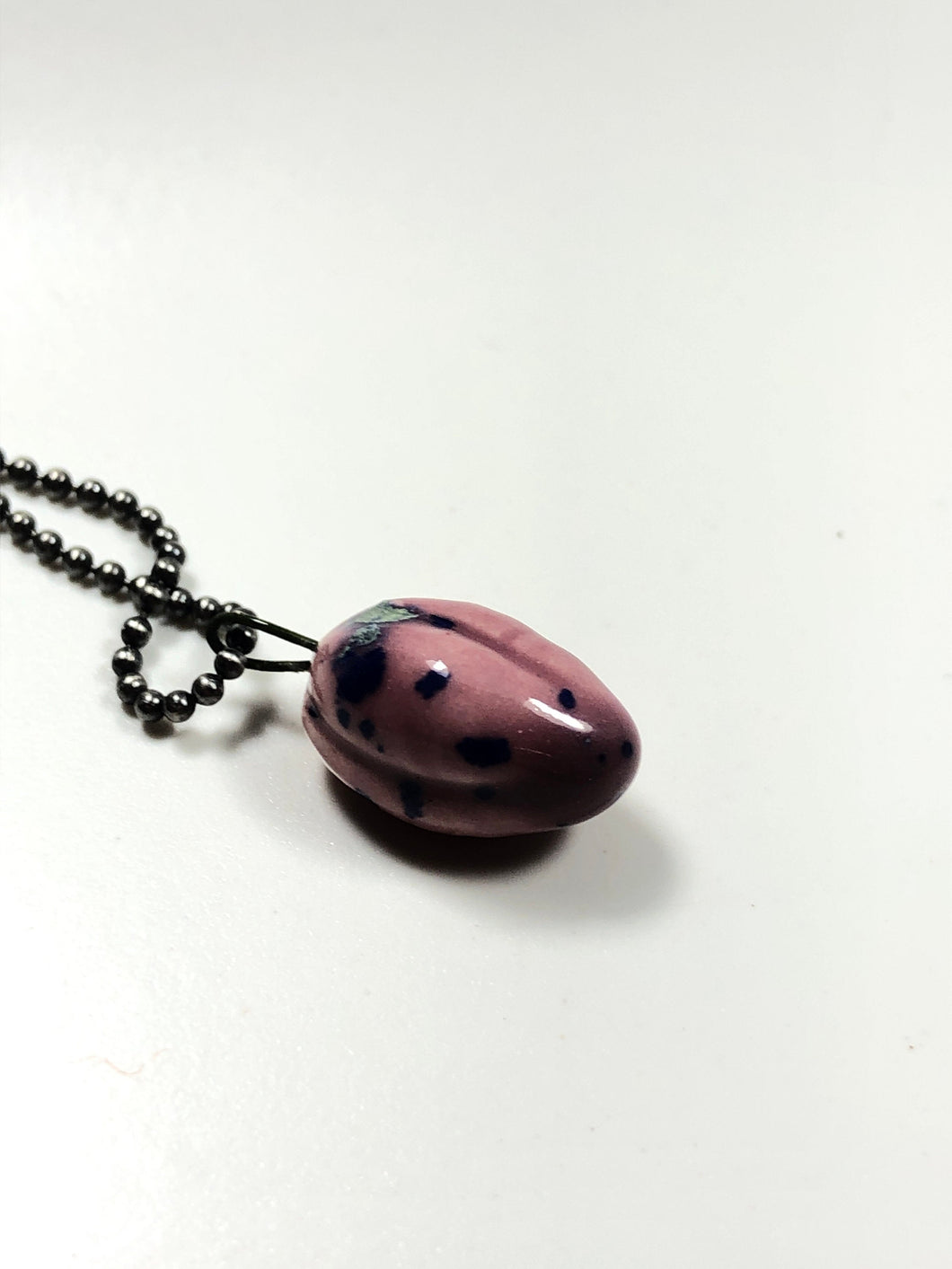 purple and blue pendant