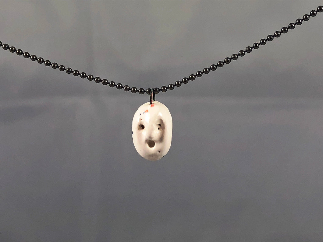 ceramic face pendant C