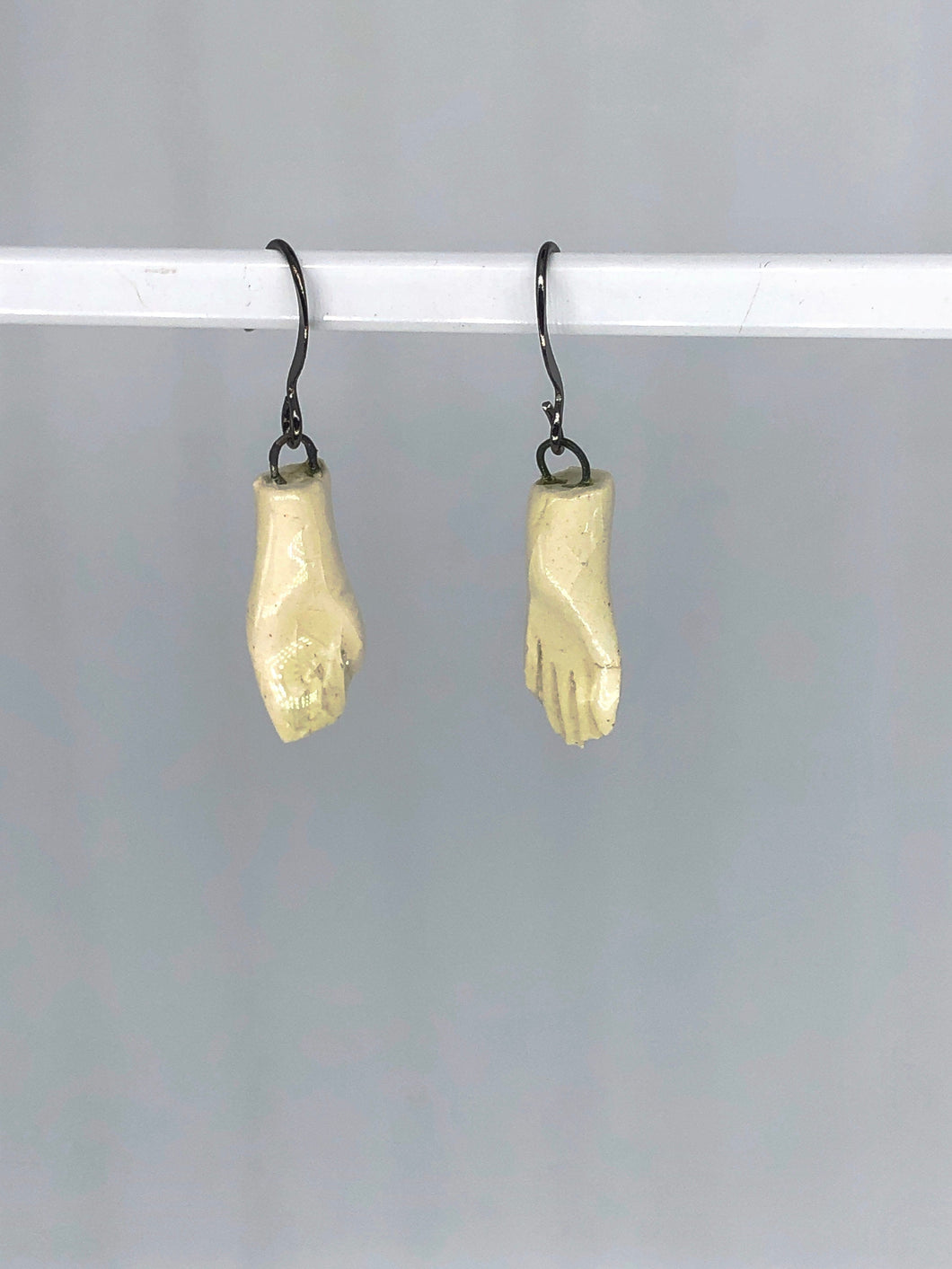 hand earrings