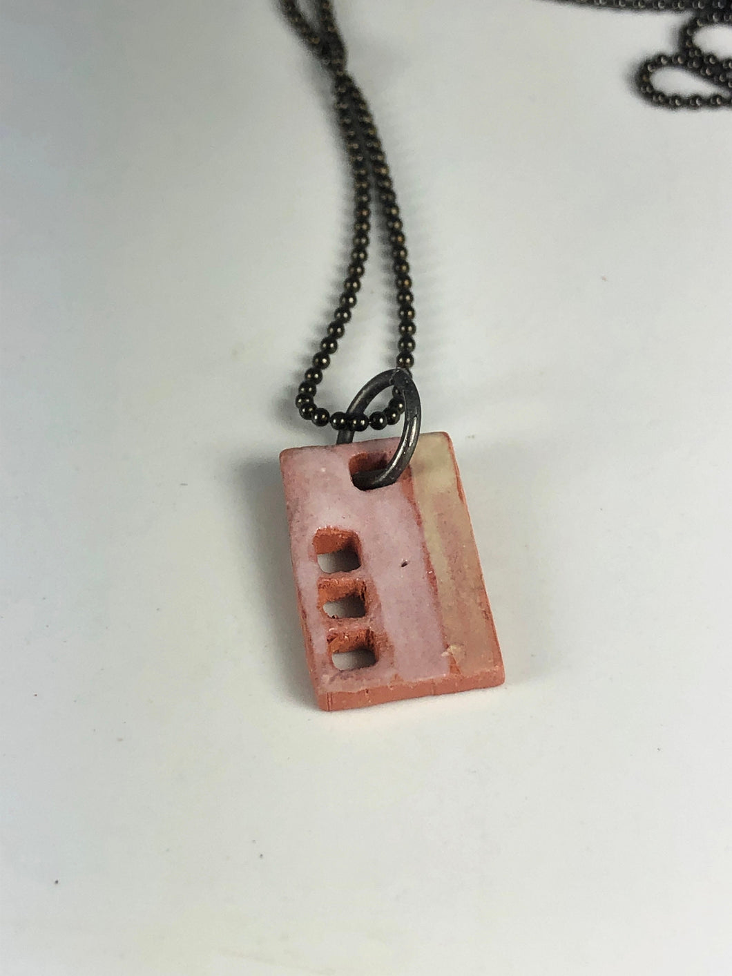 pink and yellow pendant