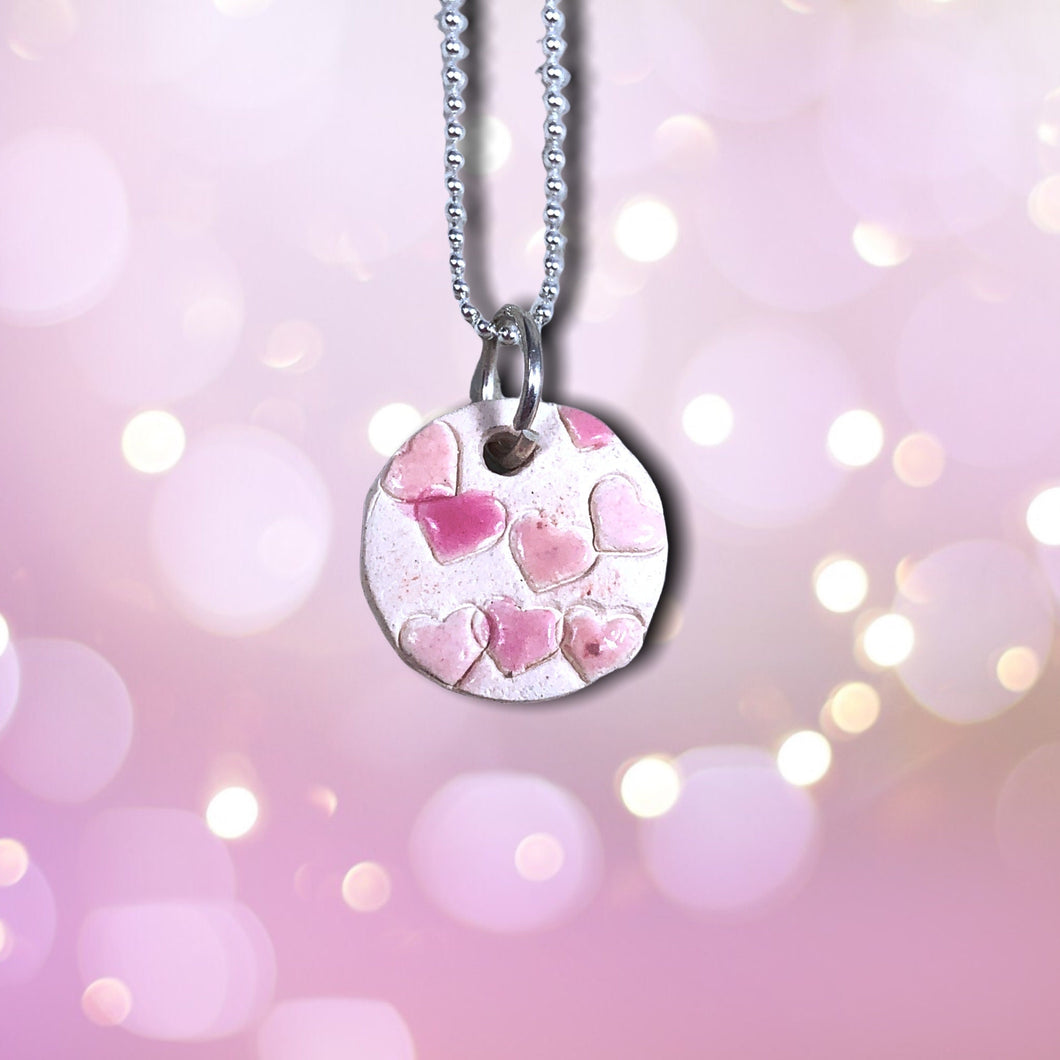 round pink hearts pendant