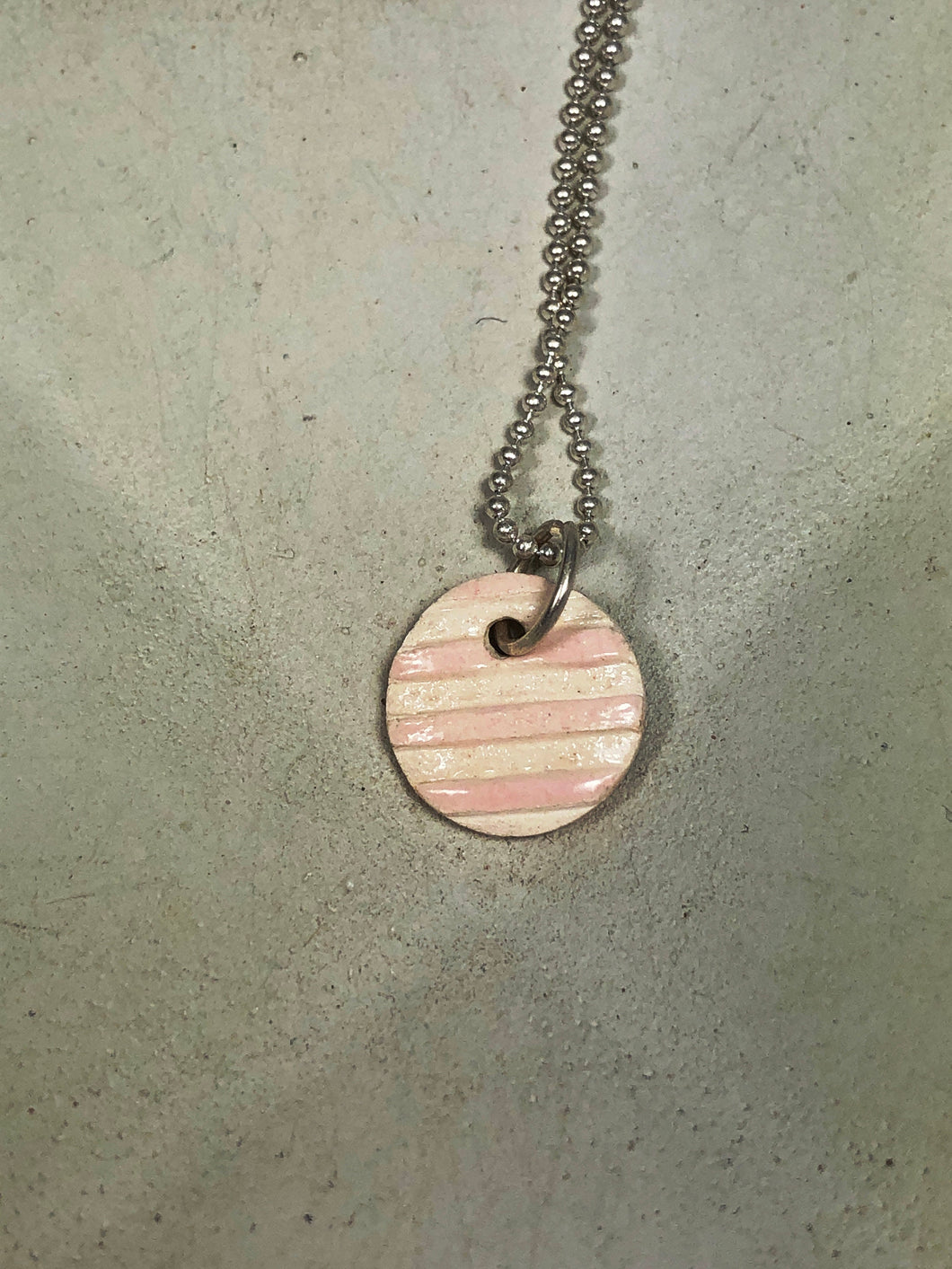 pink striped round ceramic pendant