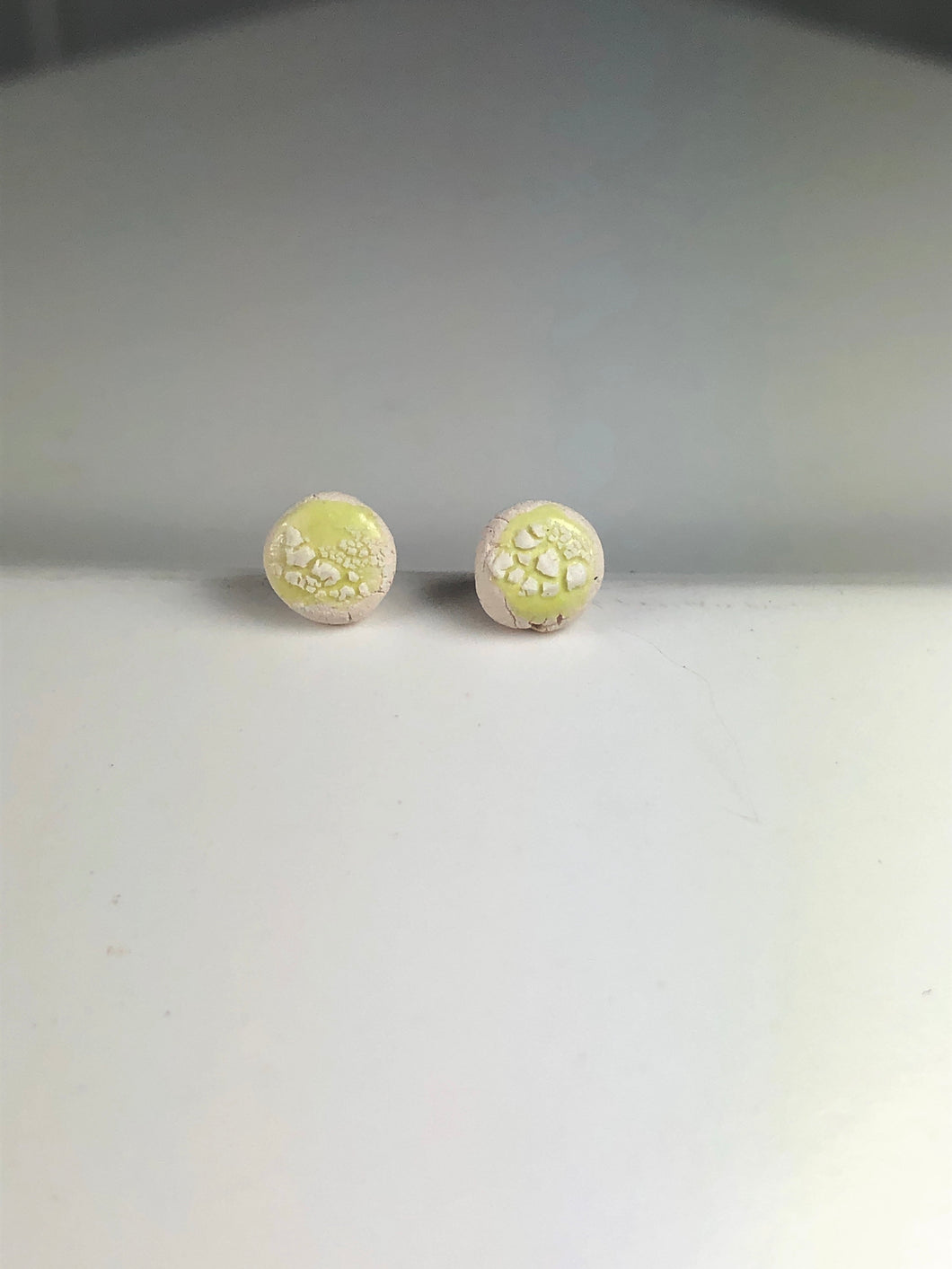 pale green on white clay crackle studs