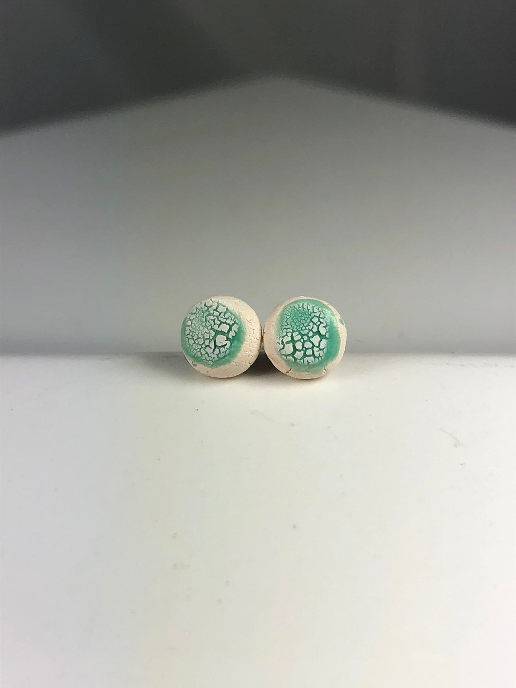 teal on white clay crackle studs