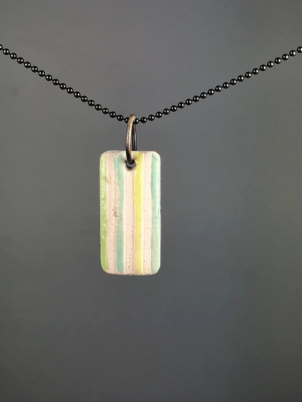 green stripes on white pendant