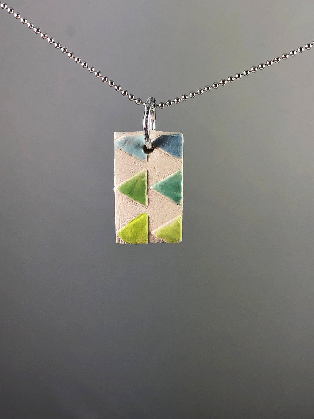 green and blue triangles pendant