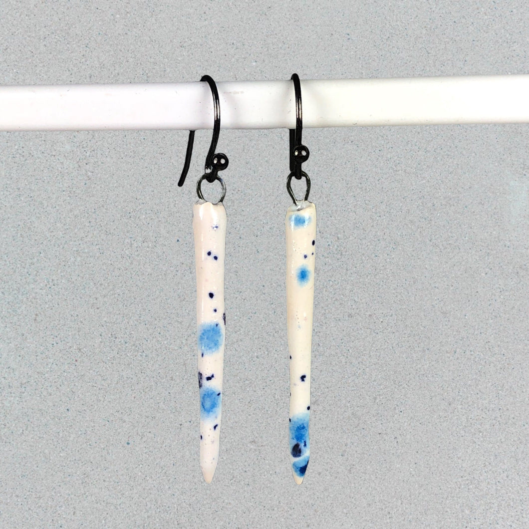 blue and white spike earrings