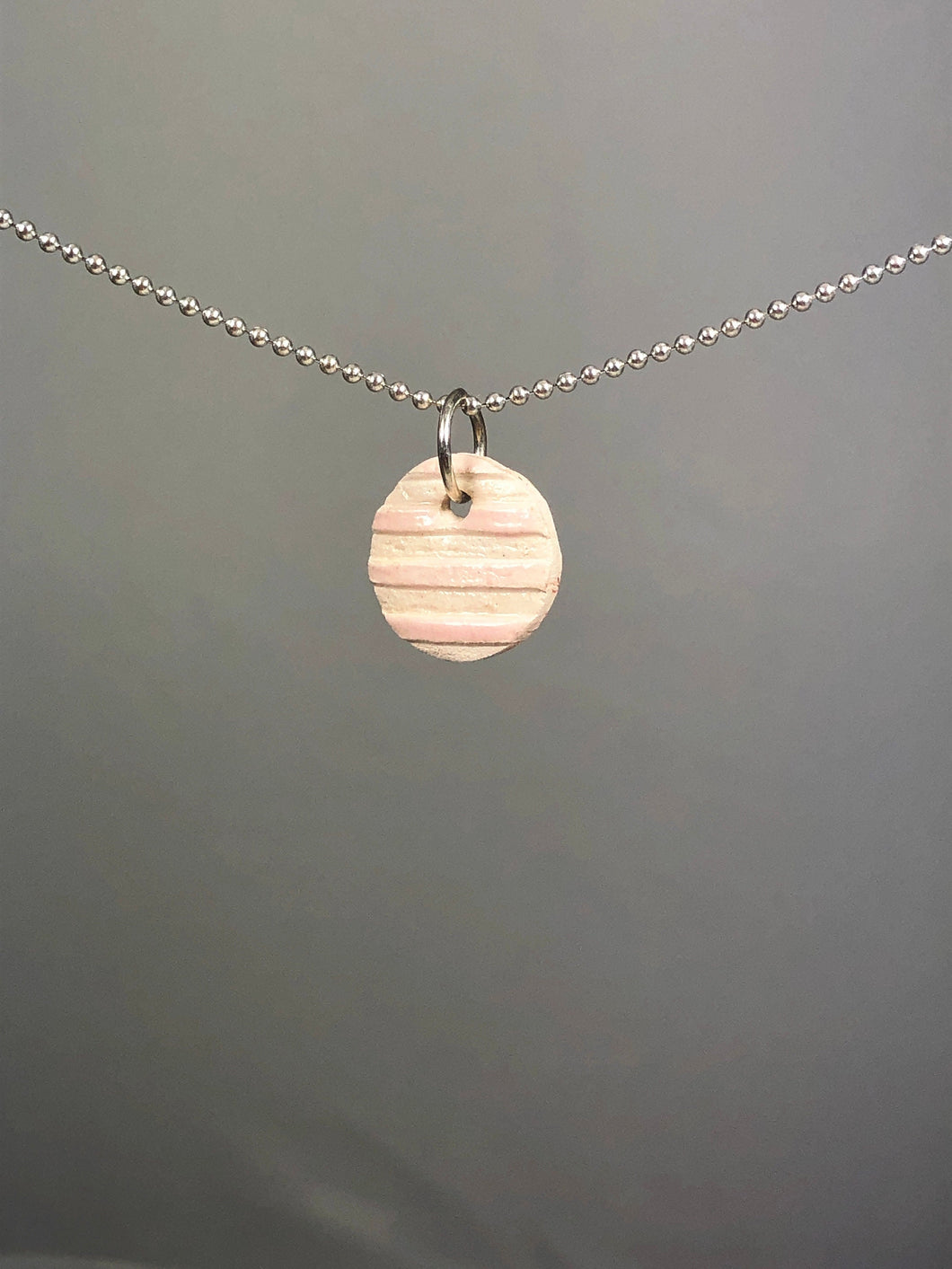 pink striped round pendant