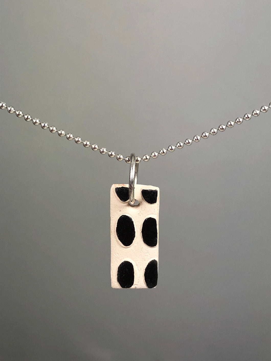 black oval dots pendant